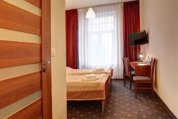 Фото номера Двухместный номер с 2 отдельными кроватями Отель Hotel Lothus г. Вроцлав 2