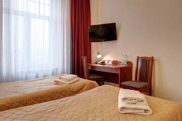 Фото номера Двухместный номер с 2 отдельными кроватями Отель Hotel Lothus г. Вроцлав 5