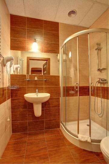 Фото номера Двухместный номер с 2 отдельными кроватями Отель Hotel Lothus г. Вроцлав 6