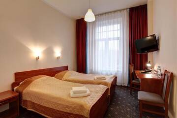 Фото номера Двухместный номер с 2 отдельными кроватями Отель Hotel Lothus г. Вроцлав 7