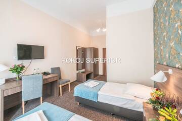 Фото номера Улучшенный двухместный номер с 2 отдельными кроватями Отель Hotel Polonia Centrum г. Вроцлав 4