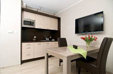 Фото номера Апартаменты-студио (для 2 взрослых) Апартаменты Silver Apartments г. Вроцлав 32