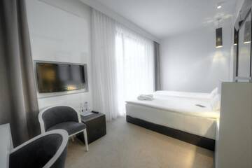Фото номера Стандартный двухместный номер с 2 отдельными кроватями Отель Platinum Palace Boutique Hotel г. Вроцлав 2