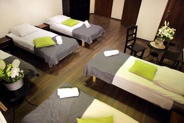 Фото номера Четырехместный номер Хостелы Royal Hostel г. Вроцлав 10