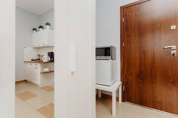 Фото номера Двухместный номер-студио Делюкс с 1 кроватью Апартаменты Grey Apartments II г. Вроцлав 20
