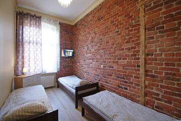 Фото номера Трехместный номер с собственной ванной комнатой Хостелы Vanilla Hostel Wrocław г. Вроцлав 2