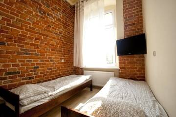 Фото номера Трехместный номер с собственной ванной комнатой Хостелы Vanilla Hostel Wrocław г. Вроцлав 5