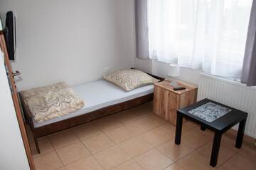 Фото номера Двухместный номер с 1 кроватью и собственной ванной комнатой Проживание в семье Pensjonat DobraNocka г. Вроцлав 2