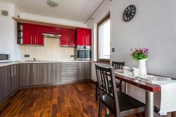 Фото номера Улучшенный семейный номер Апартаменты Mala Italia Apartments г. Вроцлав 6