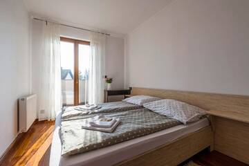 Фото номера Улучшенный семейный номер Апартаменты Mala Italia Apartments г. Вроцлав 5