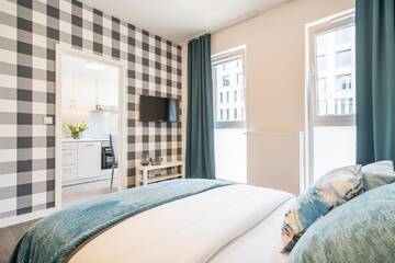 Фото номера Улучшенные апартаменты Апартаменты Apartament24 Dąbrowskiego г. Вроцлав 2
