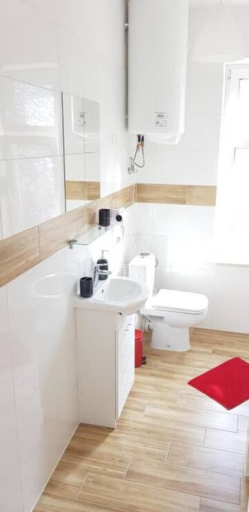 Фото номера Двухместный номер Делюкс с 1 кроватью и душем Апартаменты Colourful Rooms г. Вроцлав 6