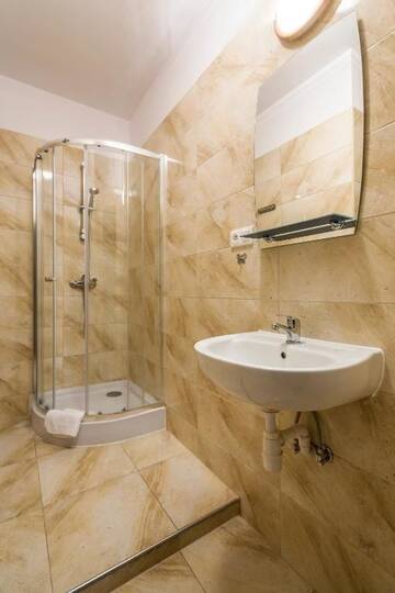 Фото номера Апартаменты с 3 спальнями Апартаменты Galeria Italiana Apartments г. Вроцлав 15