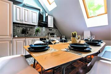 Фото номера Семейный суперлюкс Апартаменты Galeria Italiana Apartments г. Вроцлав 30