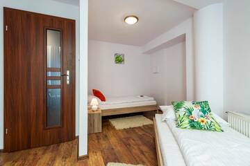 Фото номера Апартаменты с 3 спальнями Апартаменты Galeria Italiana Apartments г. Вроцлав 7