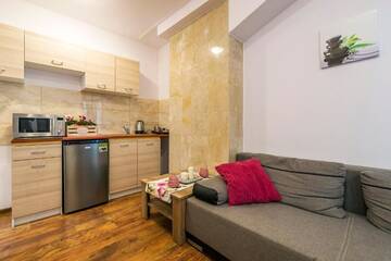 Фото номера Апартаменты с 3 спальнями Апартаменты Galeria Italiana Apartments г. Вроцлав 11
