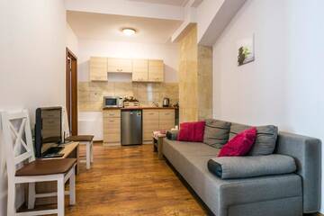 Фото номера Апартаменты с 3 спальнями Апартаменты Galeria Italiana Apartments г. Вроцлав 12