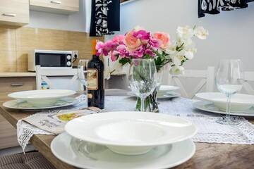 Фото номера Апартаменты с 2 спальнями Апартаменты Galeria Italiana Apartments г. Вроцлав 3