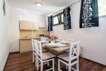 Фото номера Апартаменты с 2 спальнями Апартаменты Galeria Italiana Apartments г. Вроцлав 10