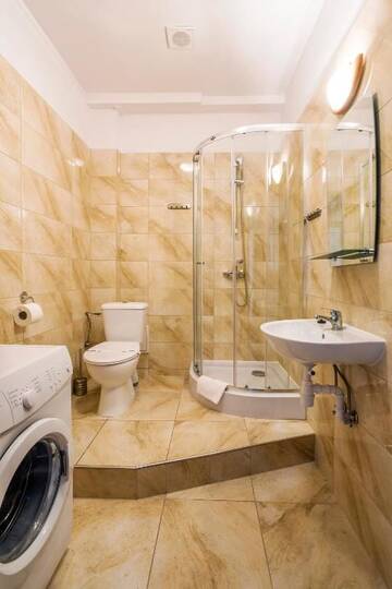 Фото номера Апартаменты с 2 спальнями Апартаменты Galeria Italiana Apartments г. Вроцлав 11