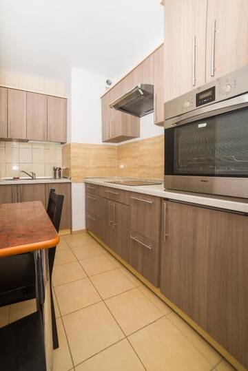 Фото номера Апартаменты с 3 спальнями Апартаменты Galeria Italiana Apartments г. Вроцлав 4