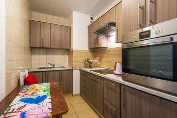 Фото номера Апартаменты с 3 спальнями Апартаменты Galeria Italiana Apartments г. Вроцлав 8