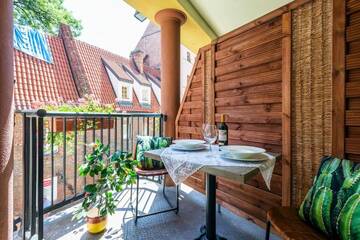 Фото номера Апартаменты с 3 спальнями Апартаменты Galeria Italiana Apartments г. Вроцлав 11