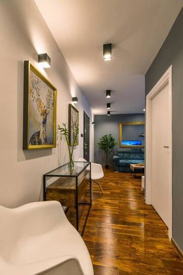 Фото номера Семейный суперлюкс Апартаменты Galeria Italiana Apartments г. Вроцлав 28