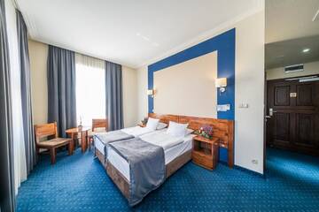 Фото номера Двухместный номер с 2 отдельными кроватями Отель Hotel Piast Wrocław Centrum г. Вроцлав 5