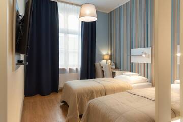 Фото номера Стандартный двухместный номер с 2 отдельными кроватями Отель Hotel Traffic Wrocław г. Вроцлав 6