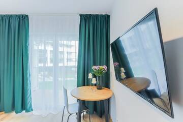 Фото номера Стандартный номер-студио Апарт-отели COIN Apartamenty Krakowska г. Вроцлав 6