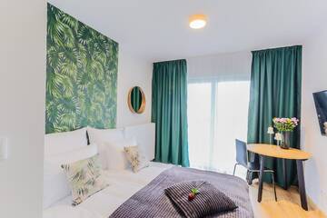 Фото номера Стандартный номер-студио Апарт-отели COIN Apartamenty Krakowska г. Вроцлав 8
