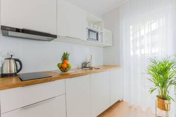 Фото номера Люкс с 1 спальней Апарт-отели COIN Apartamenty Krakowska г. Вроцлав 9