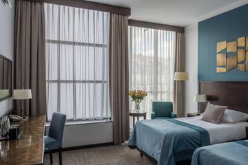 Фото номера Классический двухместный номер с 2 отдельными кроватями Отель Europeum Hotel г. Вроцлав 4